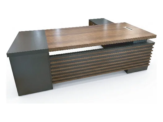 Long executive table with a ribbed front and a grey cabinet return